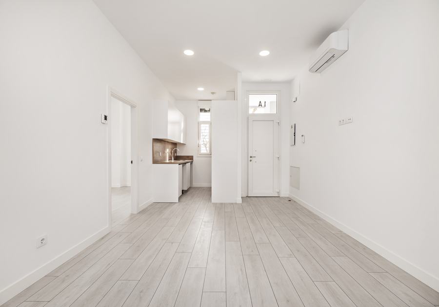 Freshly painted white interior hallway